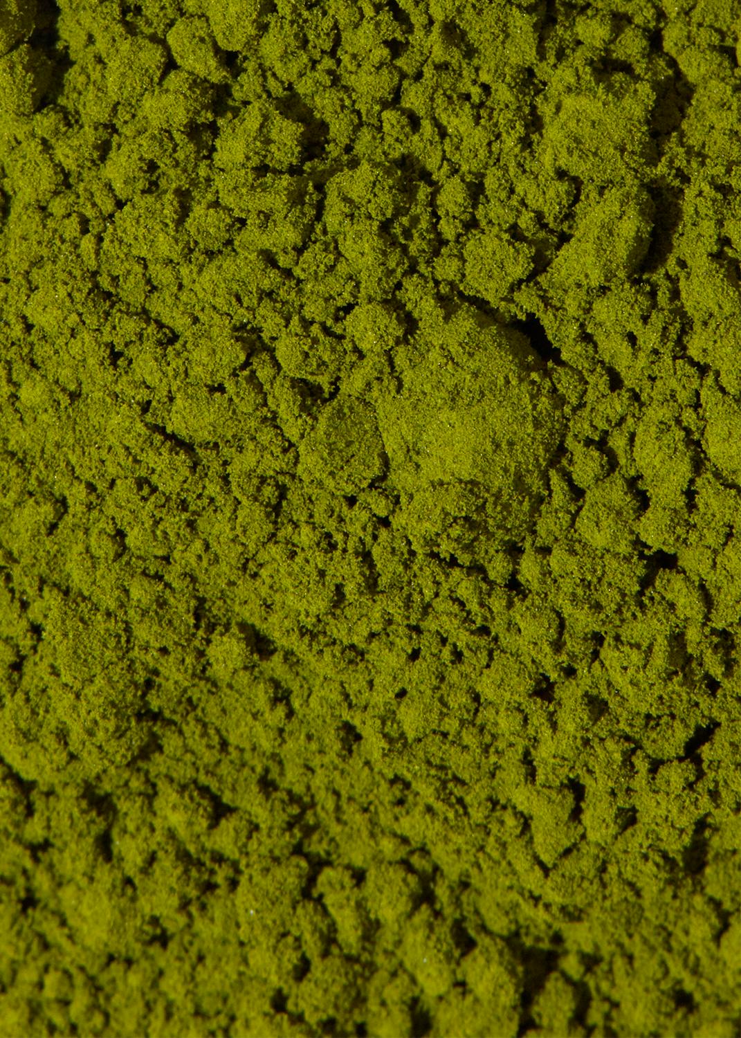 eine Nahaufnahme eines Haufens grüner Pulvers