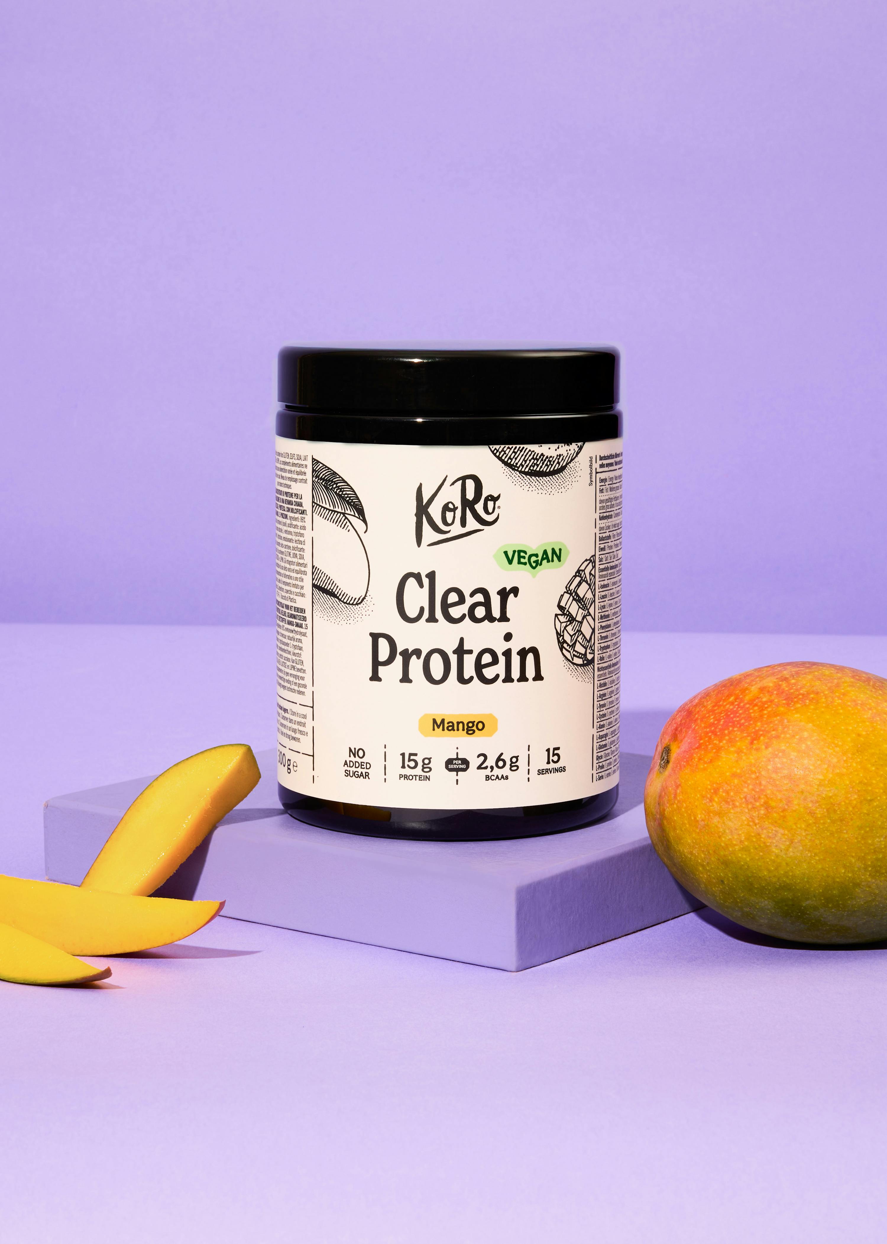 eine schwarze Flasche klares Protein mit einem mangogeschmack